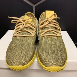 human race shoes kids gold